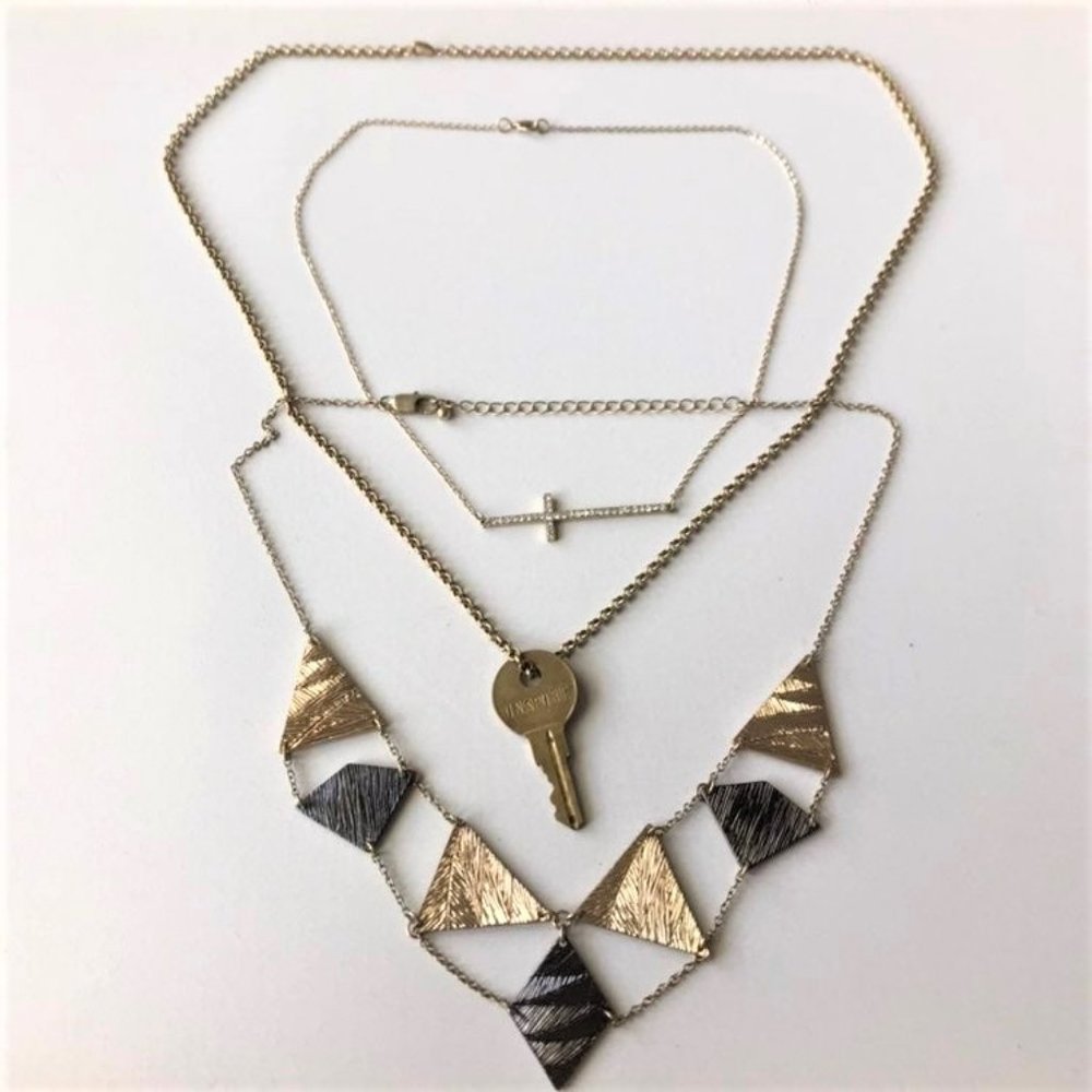 Gold necklaces key, cross, triangles